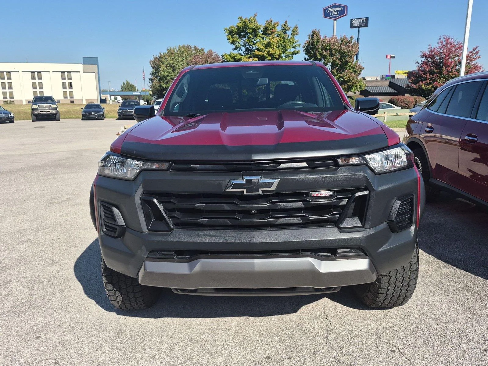 Used 2023 Radiant Red Tintcoat Chevrolet 4WD Trail Boss image 7