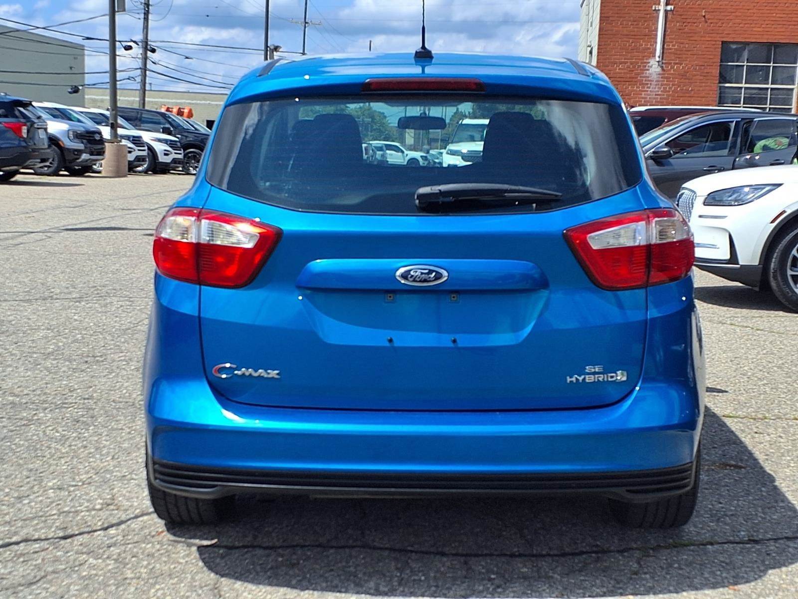Used 2013 Blue Candy Metallic Tinted Clearcoat Ford SE image 18