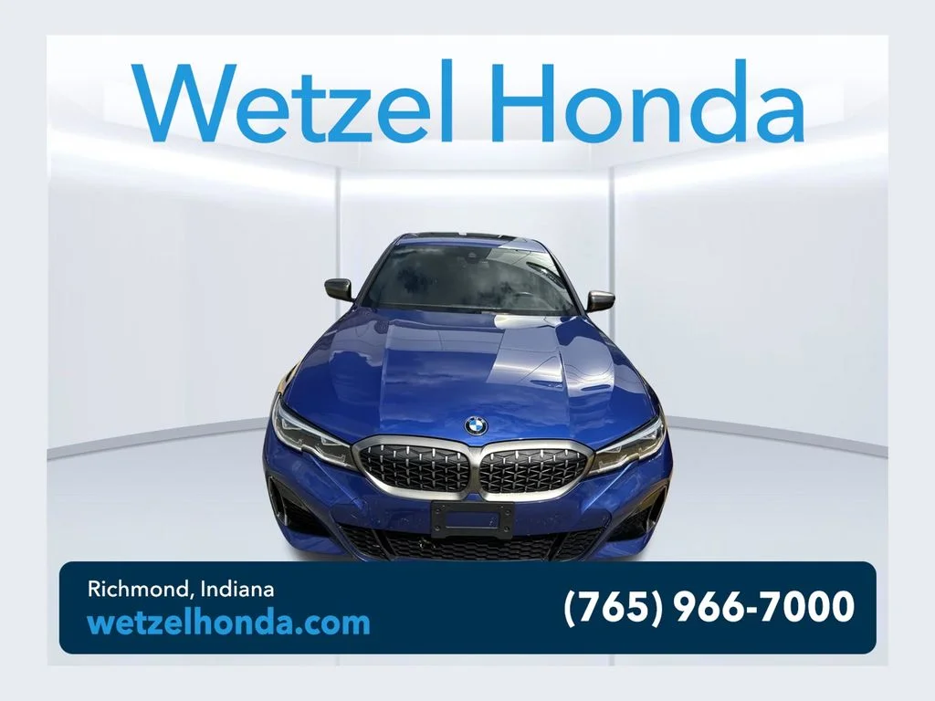 Used 2020 Blue BMW M340i xDrive image 1