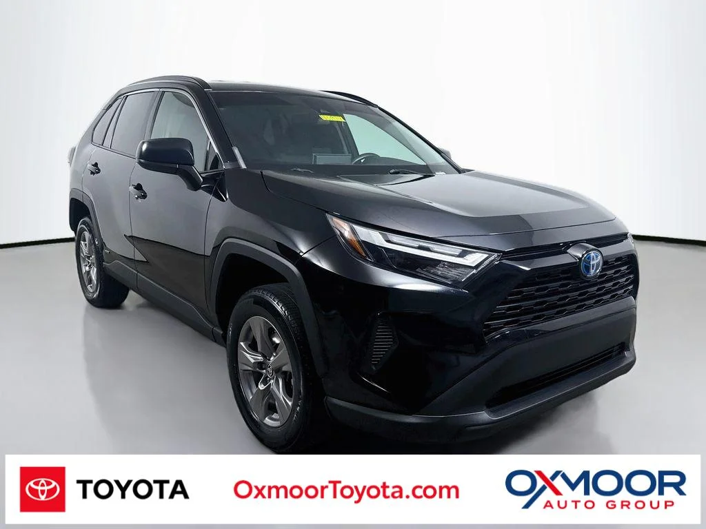 Used 2023 Midnight Black Metallic Toyota Hybrid LE image 1
