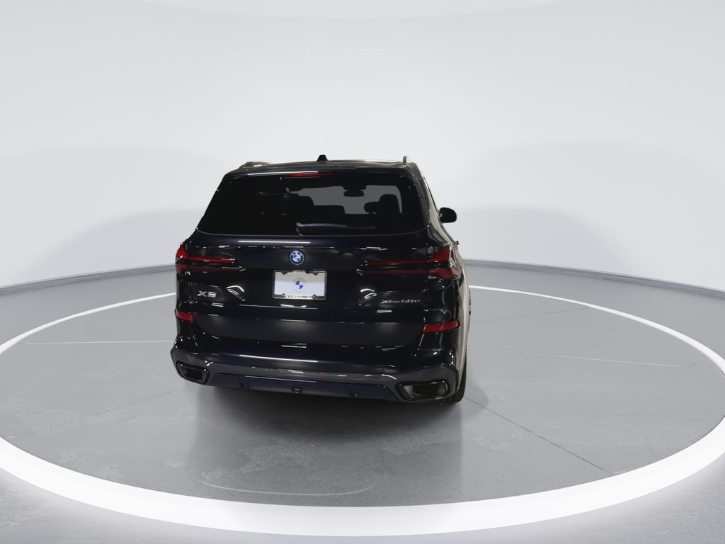 New 2026 Black BMW xDrive50e image 7