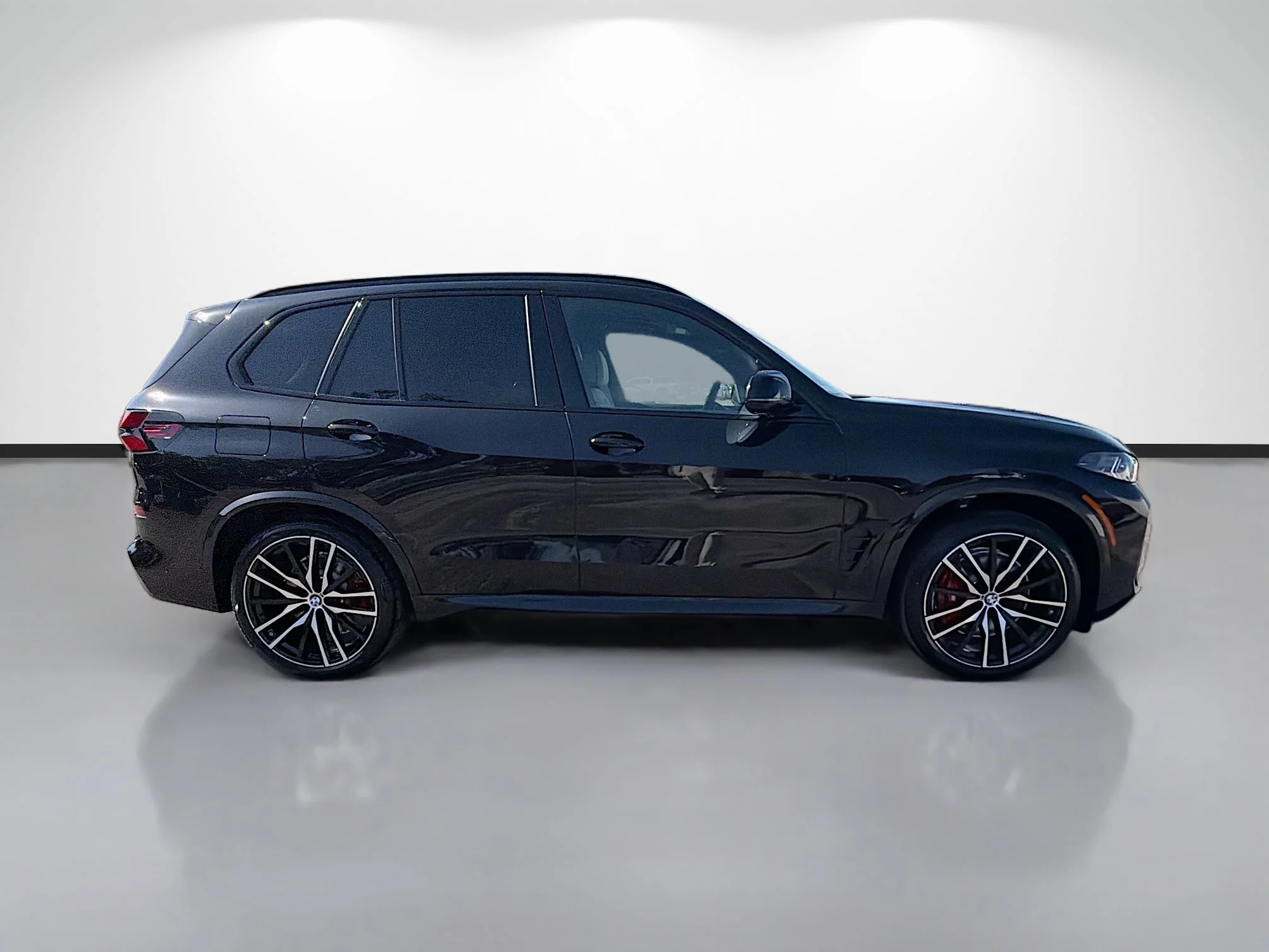 New 2026 Black Sapphire Metallic BMW M60i image 2