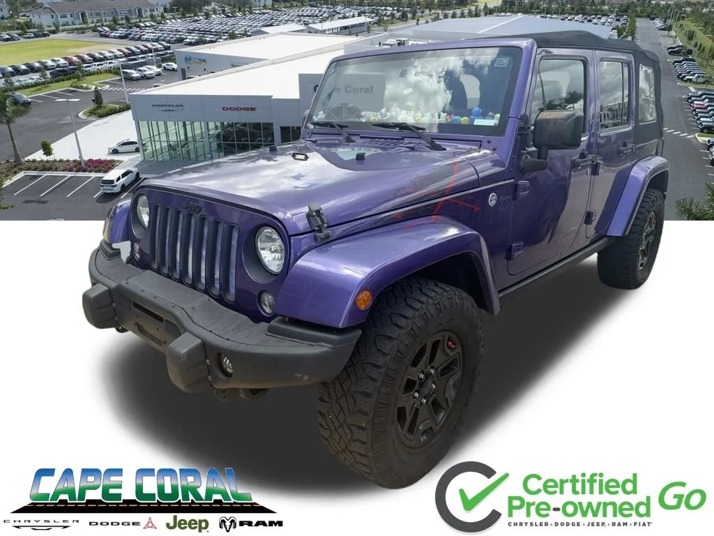 Certified Used 2016 Purple Jeep Unlimited Sahara image 1