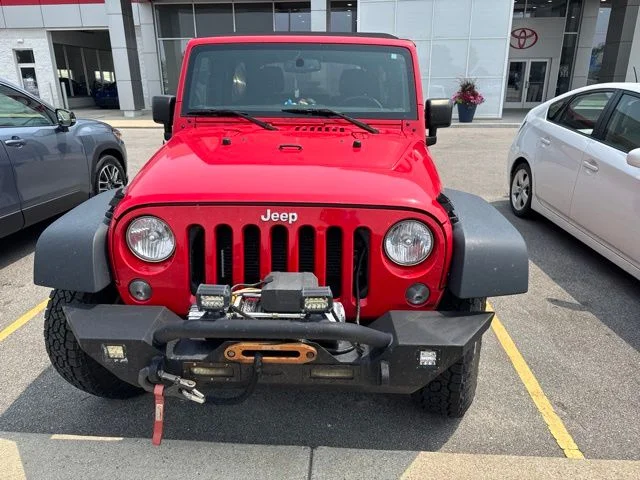 Used 2018 Red Jeep Unlimited Sport image 2