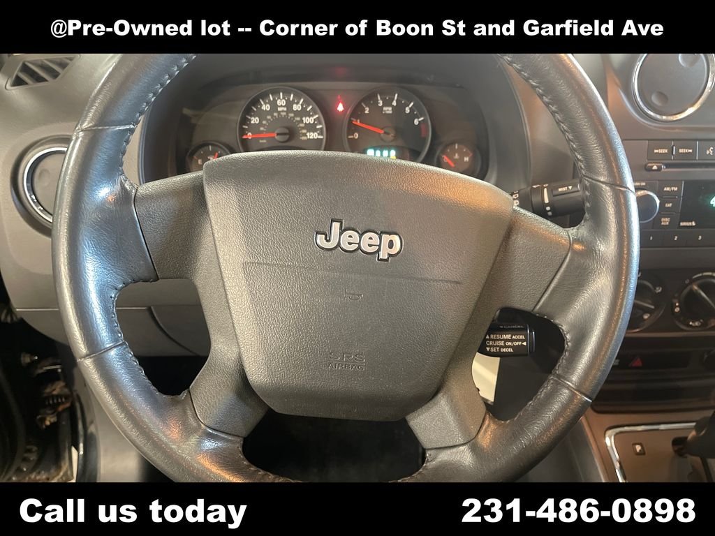Used 2009 Black Jeep Sport image 20