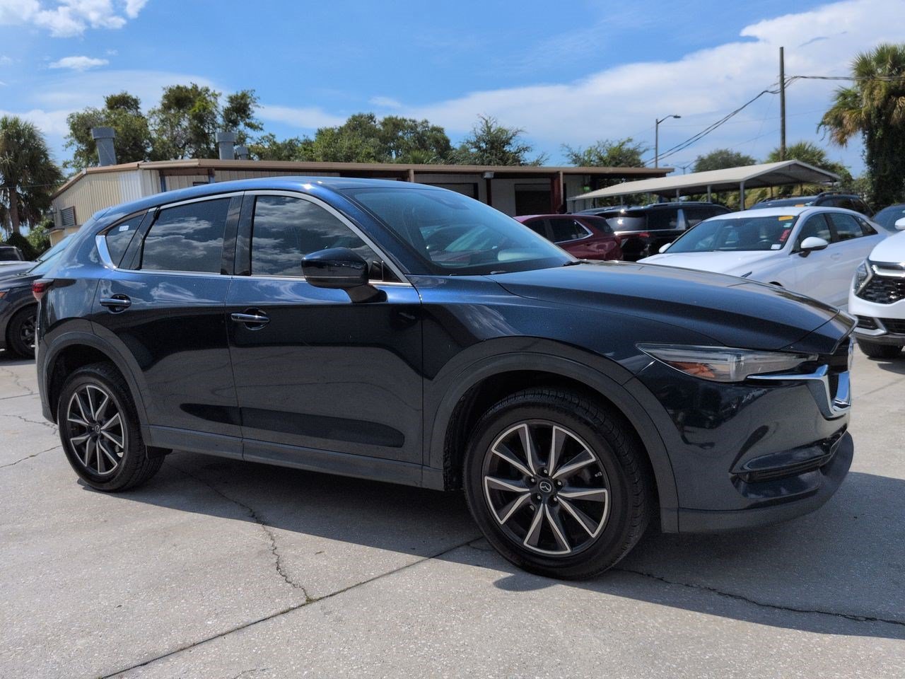 Used 2017 Deep Crystal Blue Mica Mazda Grand Select image 1