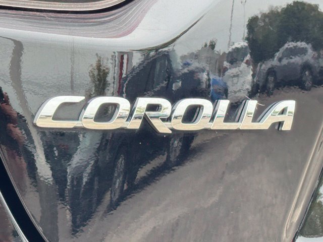 Used 2025 Midnight Black Metallic Toyota LE image 8