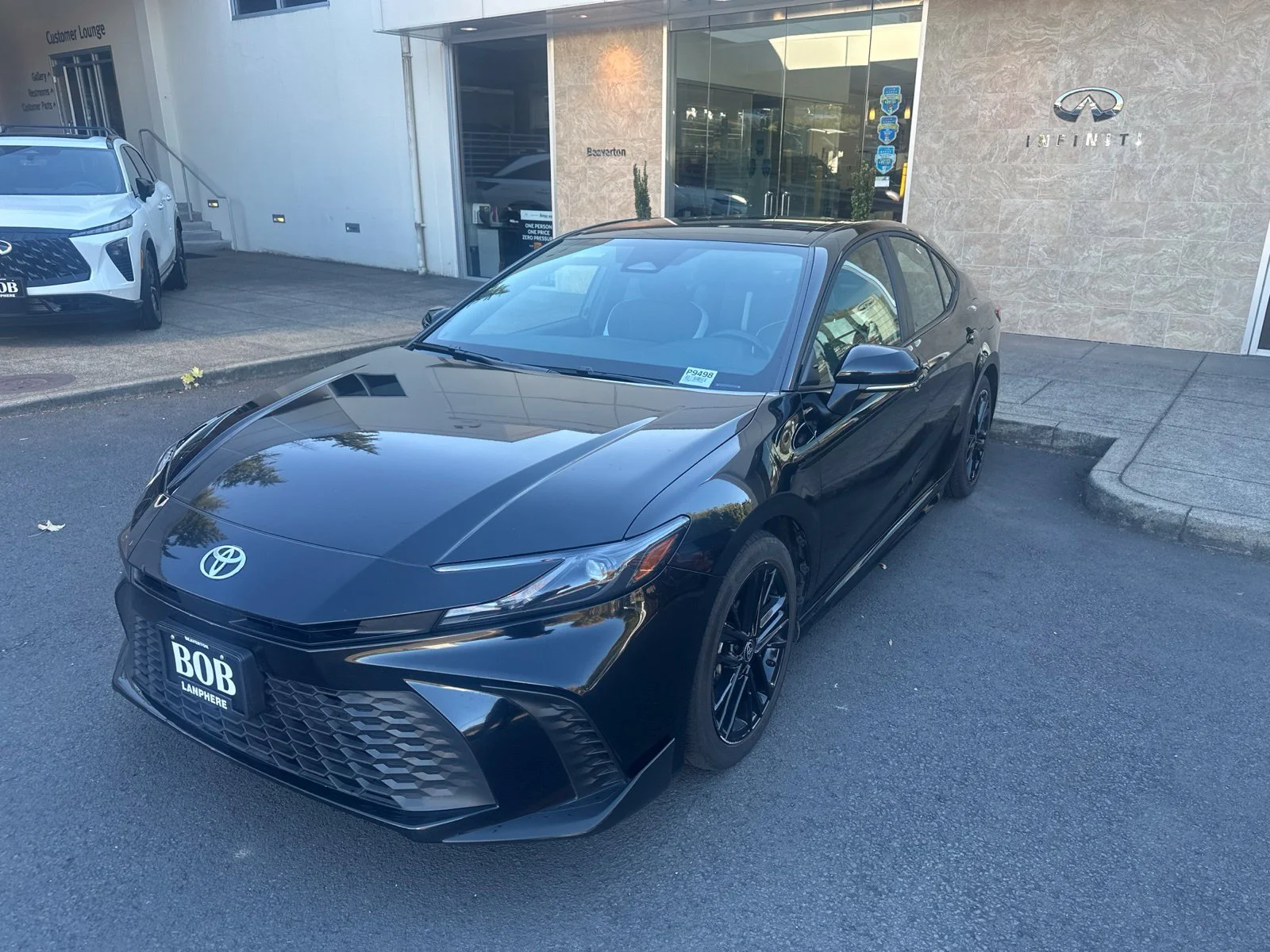 Used 2025 Black Toyota SE image 1