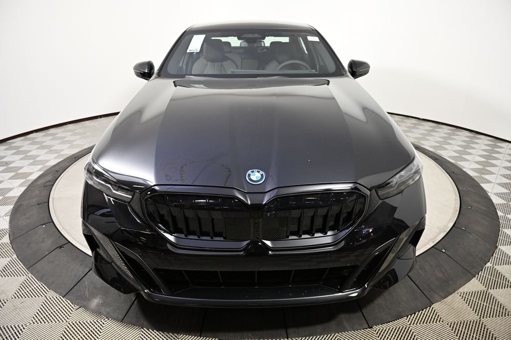 New 2027 Black Sapphire Metallic BMW 550e xDrive image 8