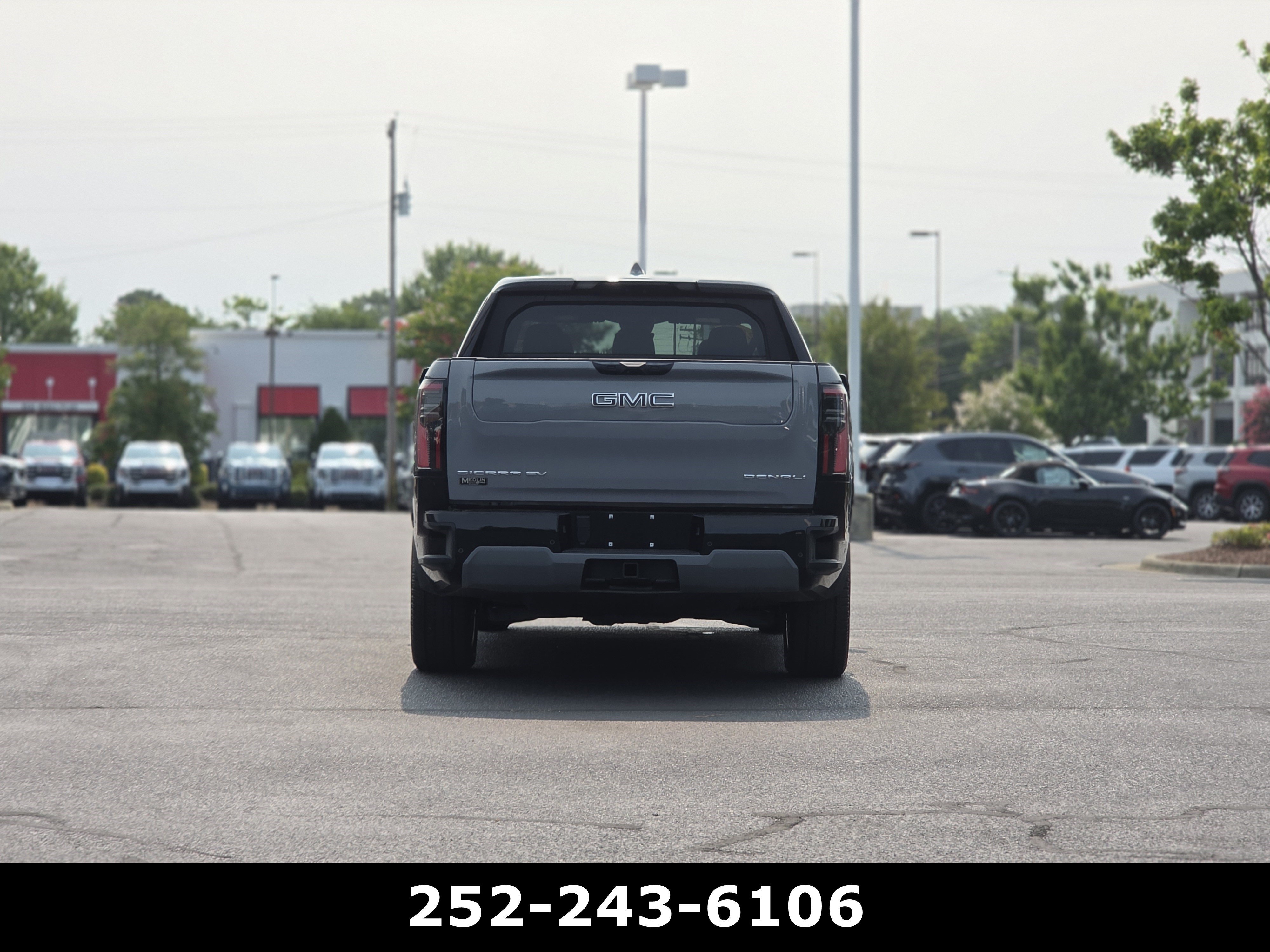 Used 2025 Thunderstorm Gray GMC Max Range Denali image 6