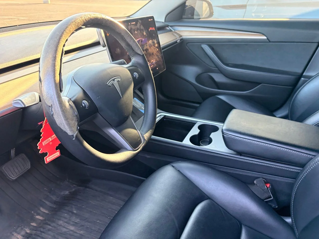 Used 2022 Solid Black Tesla Base image 8