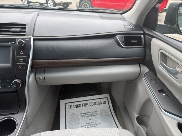 Used 2016 Midnight Black Metallic Toyota LE image 19