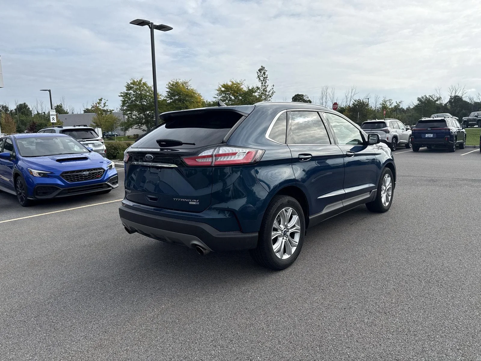 Used 2020 Dark Persian Green Ford Titanium image 4