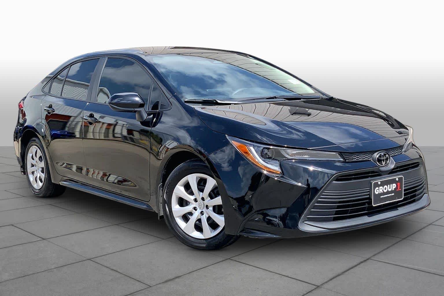 Used 2025 Midnight Black Metallic Toyota LE image 3