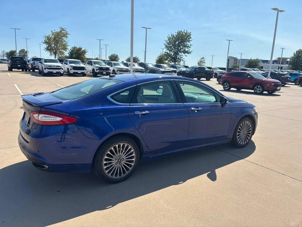 Used 2016 Blue Ford Titanium image 4
