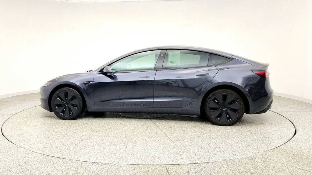 Used 2025 Stealth Grey Tesla Long Range AWD image 8