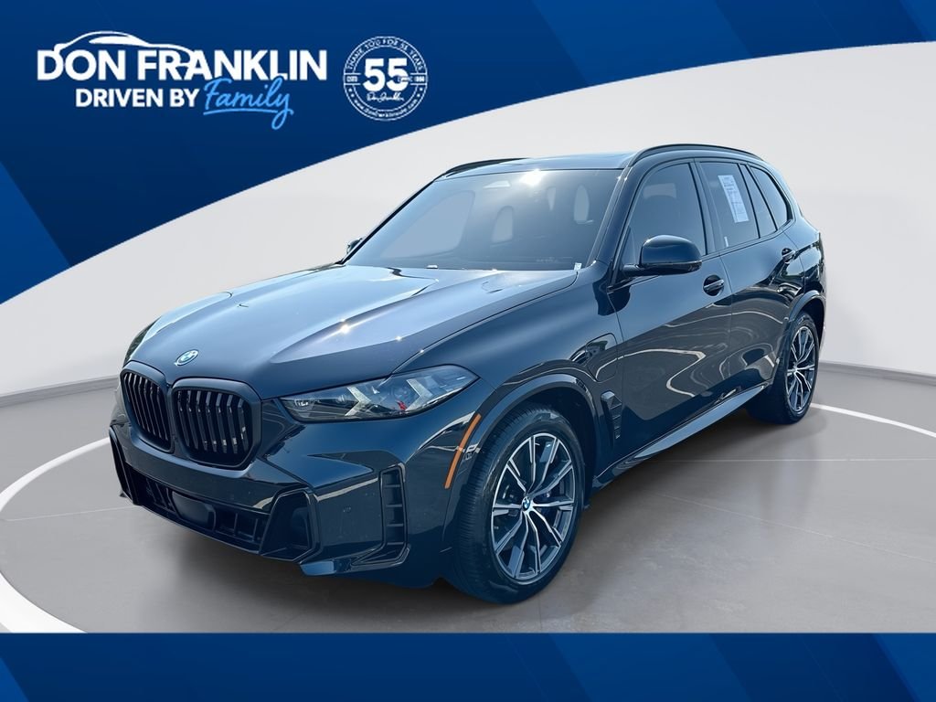Used 2025 Black BMW xDrive50e image 1