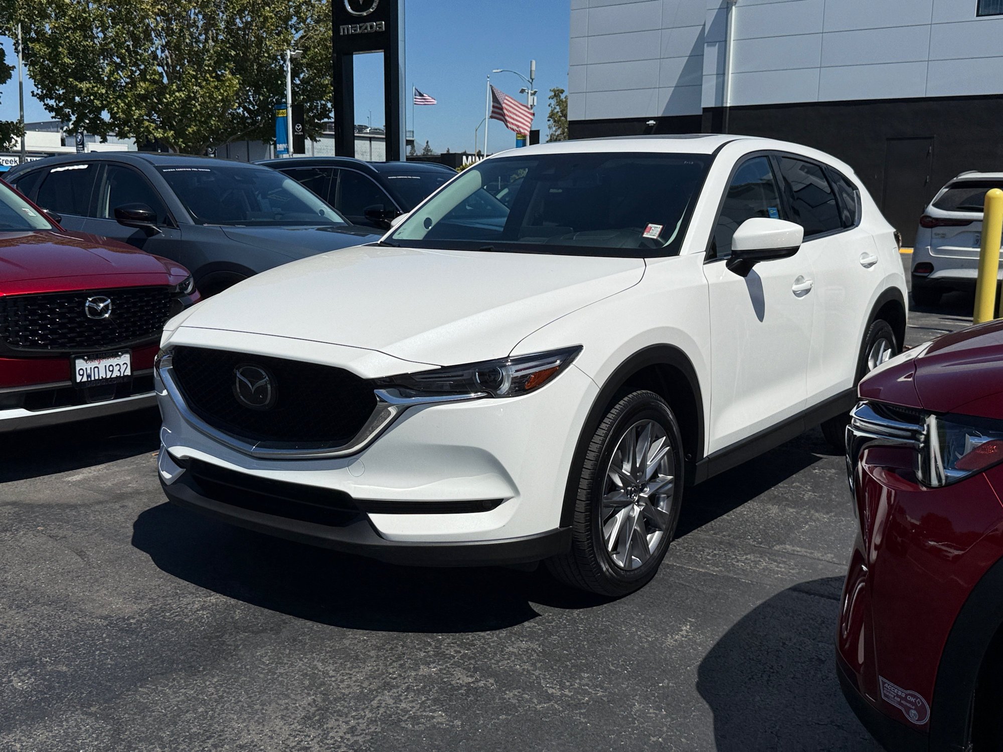 Certified Used 2021 Snowflake White Pearl Mazda Grand Touring image 1