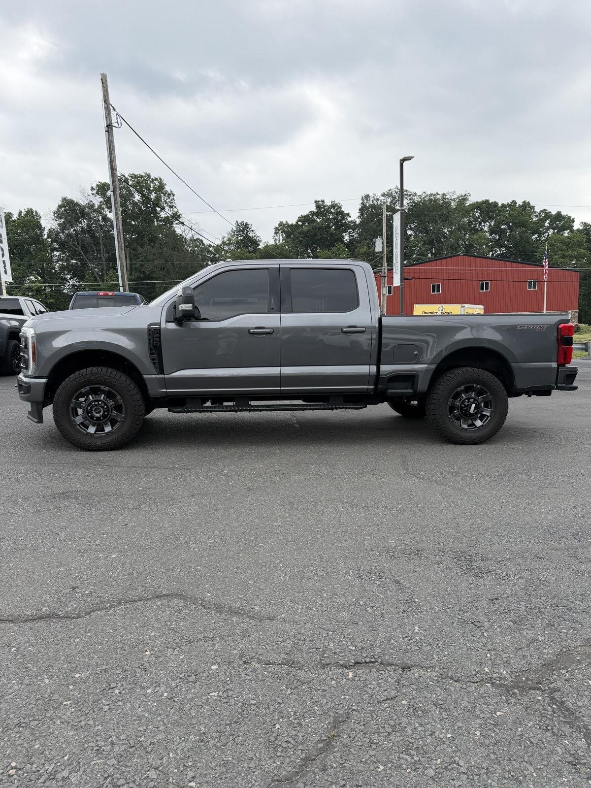 Used 2024 Carbonized Gray Metallic Ford LARIAT image 4