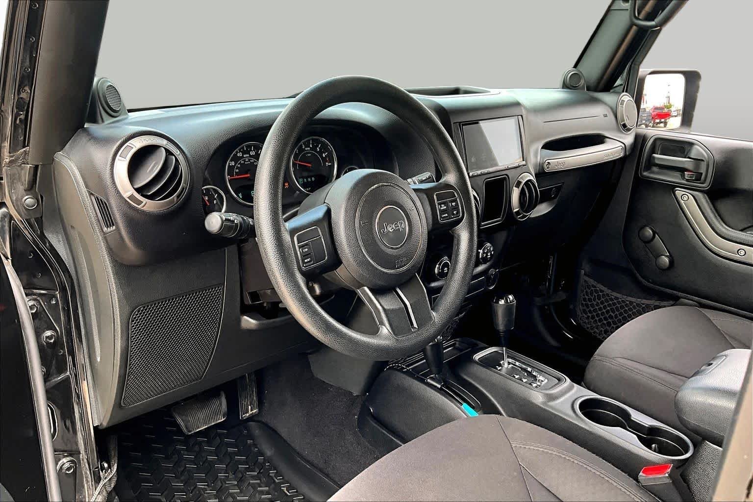 Used 2014 Black Clearcoat Jeep Sport image 17