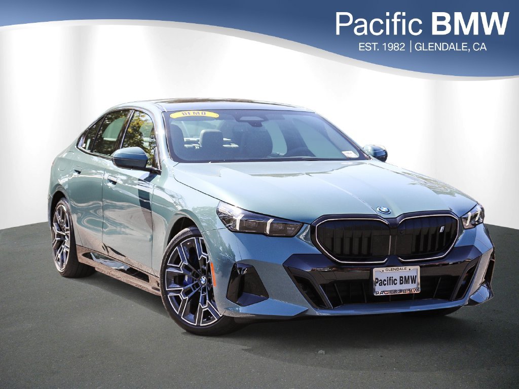 Used 2027 Cape York Green Metallic BMW xDrive40 image 1