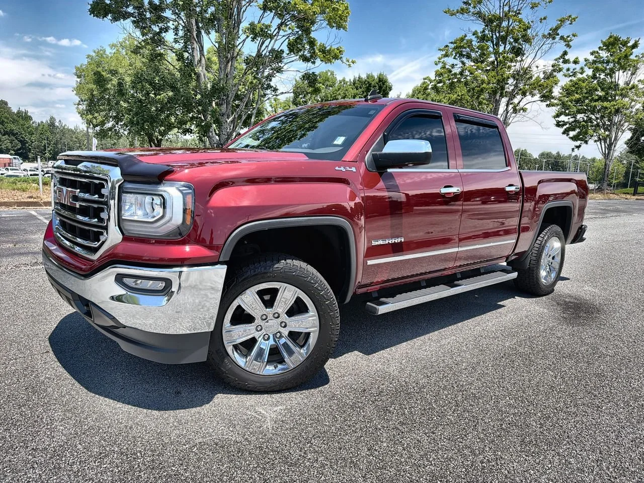 Used 2016 CRIMSON RED TINTCOAT GMC SLT image 1