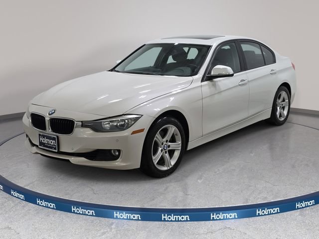Used 2015 White BMW 328i xDrive image 1