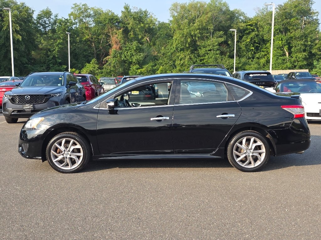 Used 2015 Super Black Nissan SR image 12