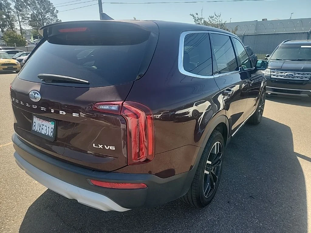 Used 2020 Purple Kia LX image 12