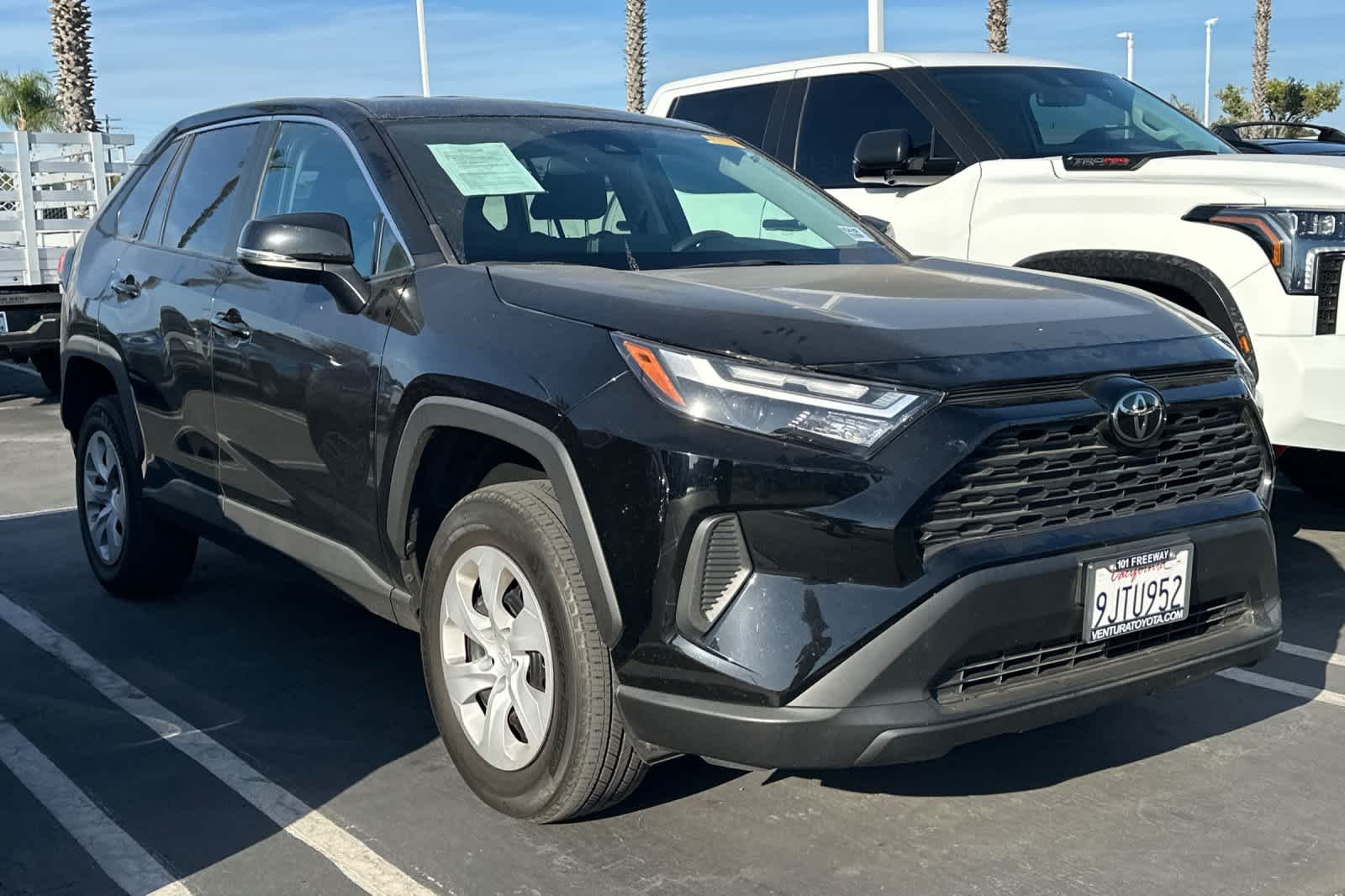 Used 2023 Midnight Black Metallic Toyota LE image 2