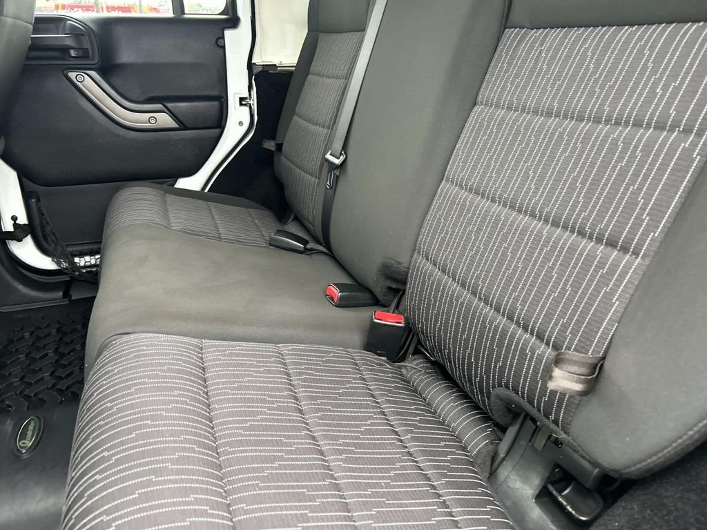 Used 2012 Bright White Jeep Unlimited Sport image 15