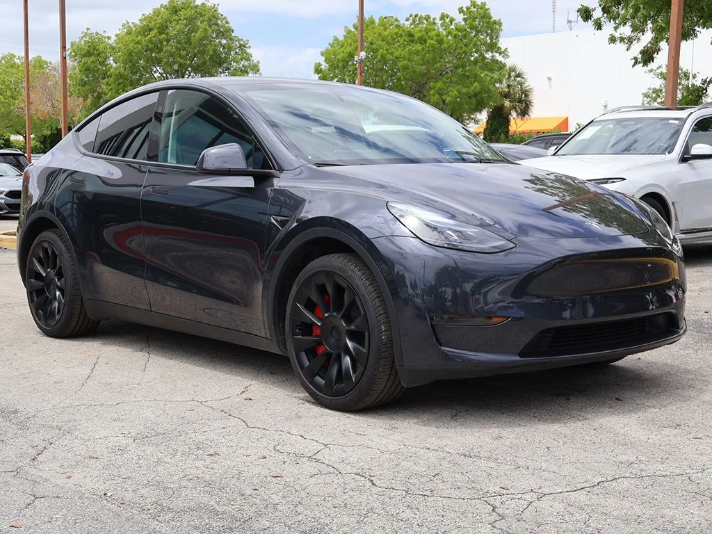 Used 2024 Tesla Model Y Long Range with VIN 7SAYGDEE2RA242488 for sale in Miami, FL