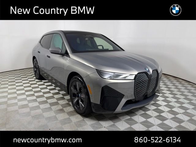 Used 2024 Gray BMW xDrive50 image 1