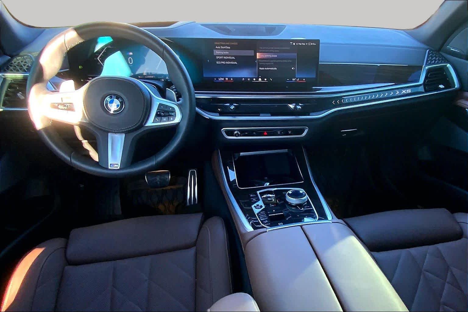 Certified Used 2025 Tanzanite Blue II Metallic BMW xDrive40i image 16