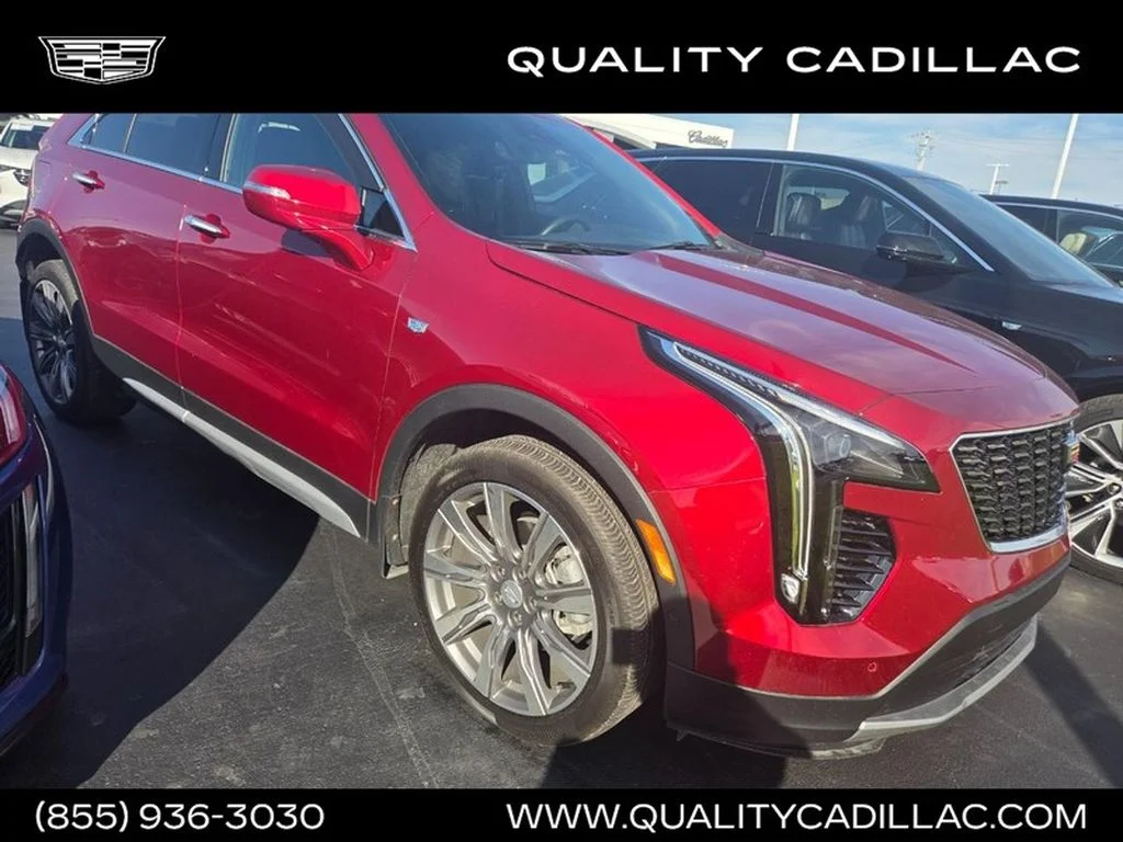Used 2023 Radiant Red Tintcoat Cadillac AWD Premium Luxury image 1