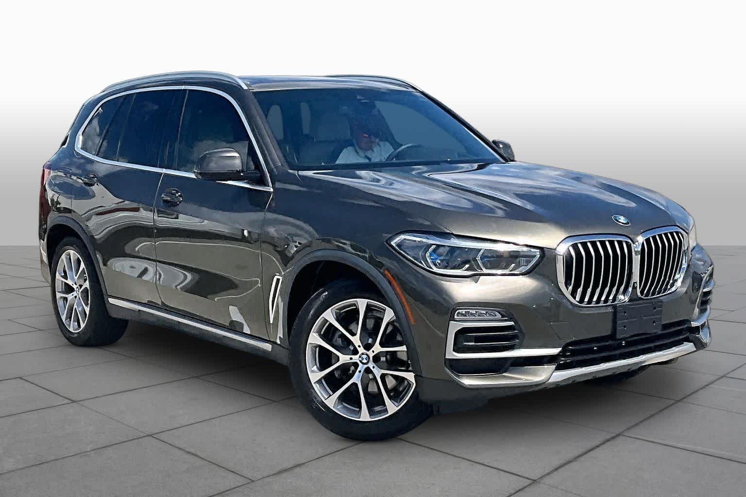 Used 2021 Manhattan Green Metallic BMW sDrive40i image 2