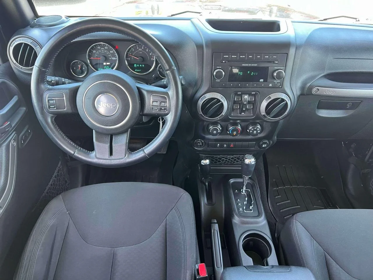 Used 2015 Black Clearcoat Jeep Sport image 14