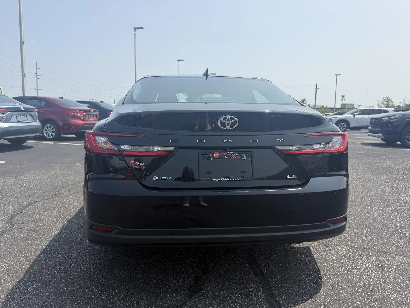 Used 2025 Midnight Black Metallic Toyota LE image 6