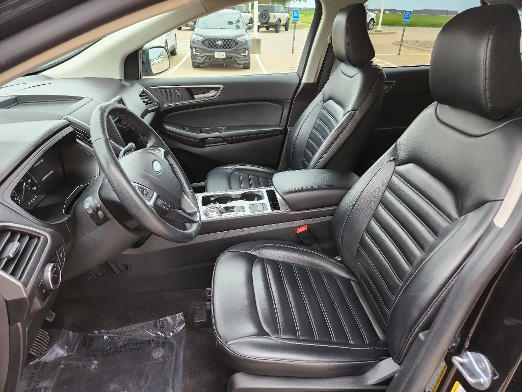 Used 2024 Agate Black Metallic Ford SEL image 12