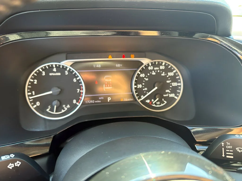 Used 2024 Pearl White Tricoat/Super Black Nissan SL image 19