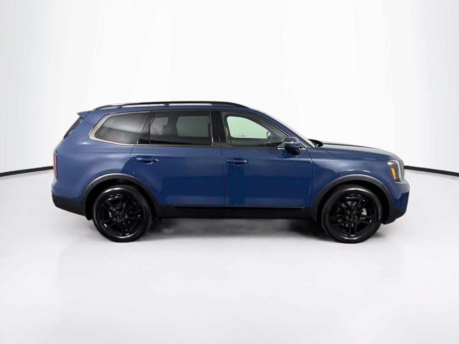 Used 2025 Midnight Lake Blue Kia EX X-Line image 11