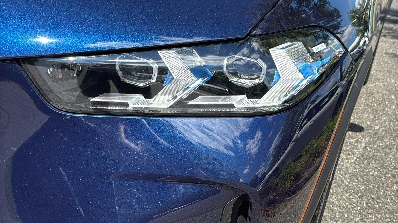 Used 2026 Tanzanite Blue II Metallic BMW xDrive40i image 7