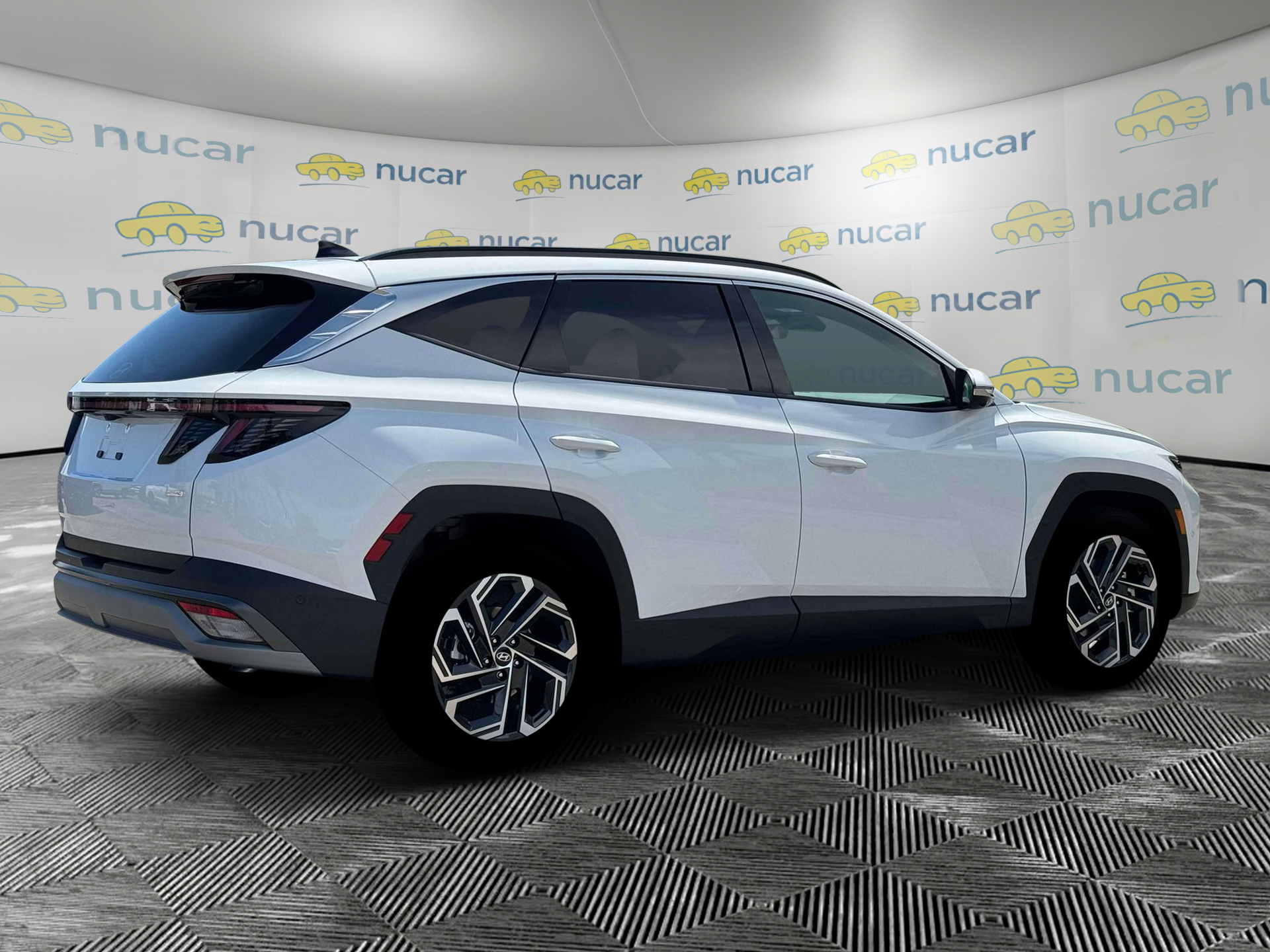 2026 Hyundai Tucson Limited in White at Nucar — photo 8
