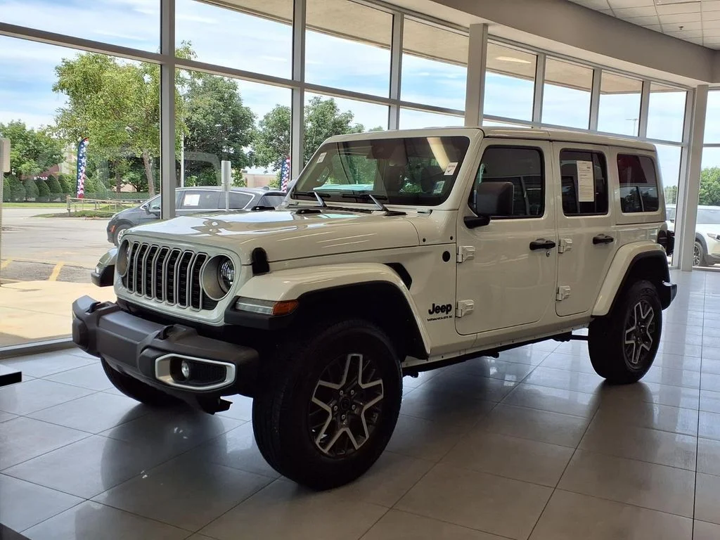 Used 2025 Jeep Wrangler 4-Door Sahara with VIN 1C4PJXEN9SW538320 for sale in Kansas City