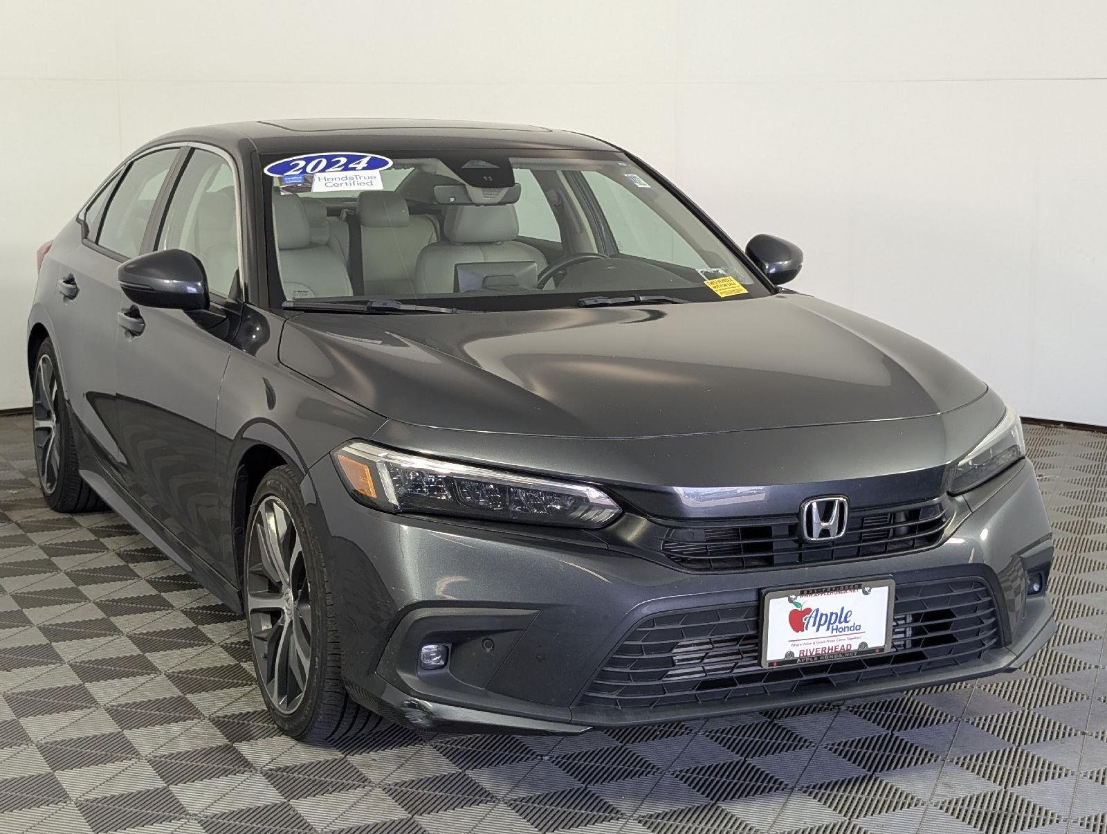 Certified Used 2024 Meteorite Gray Metallic Honda 1.5T 4D TOURING image 1