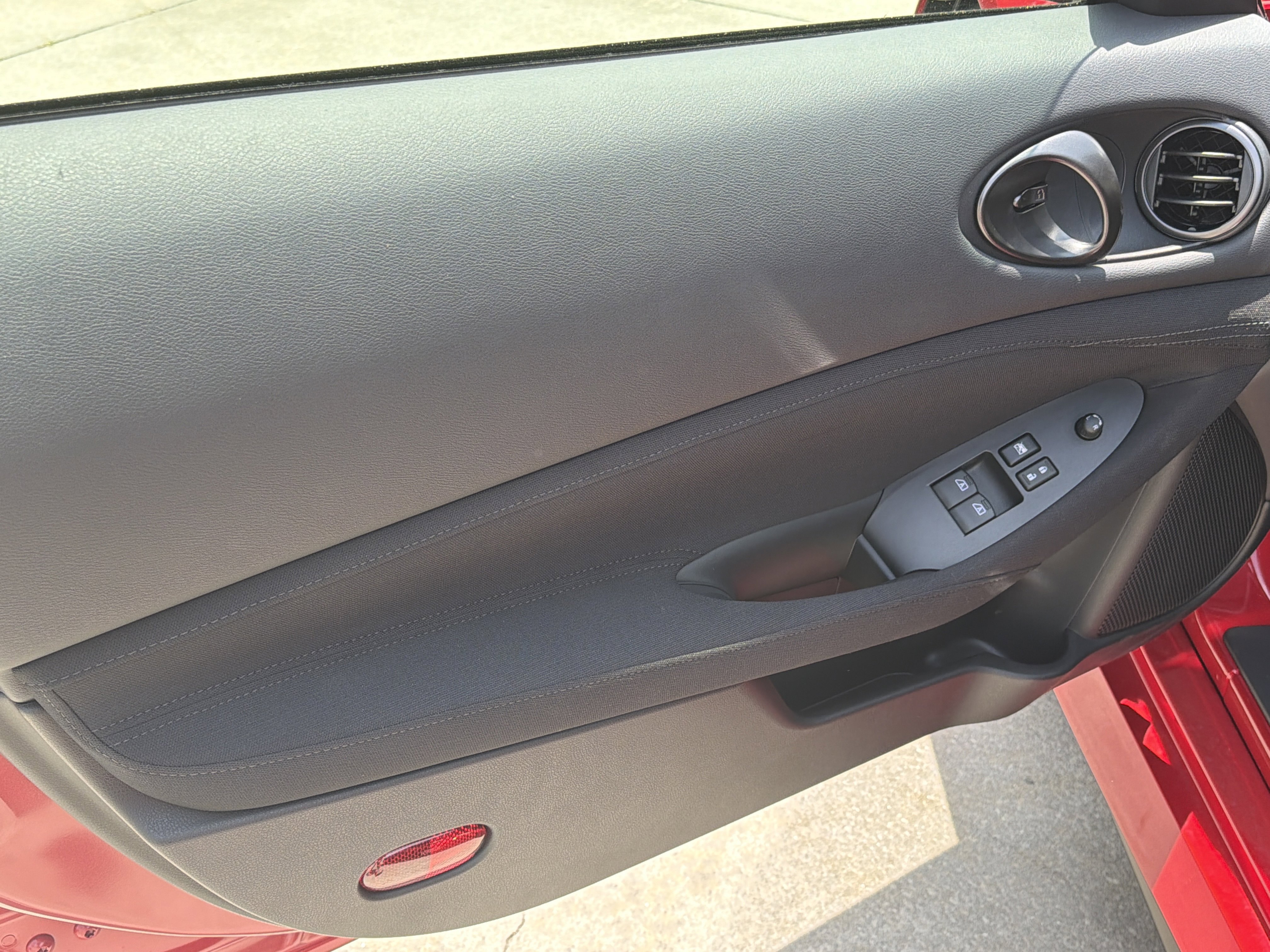 New 2026 Solid Red/Super Black Nissan Sport image 11