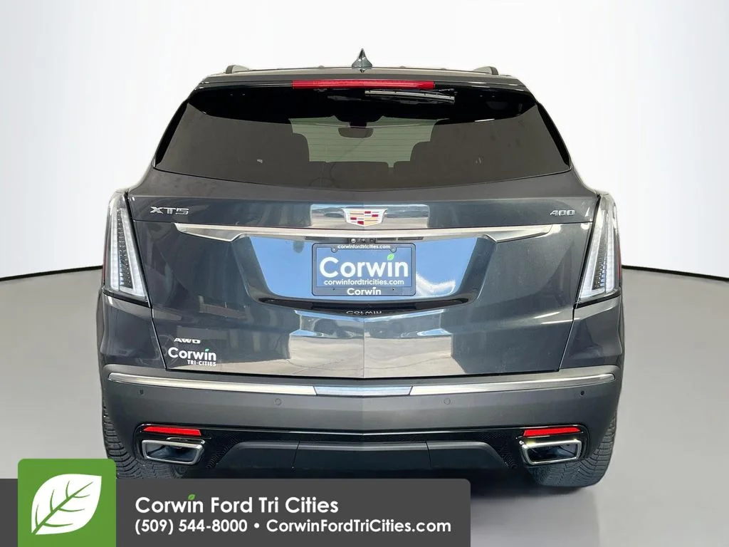 Used 2023 Stellar Black Metallic Cadillac Sport image 14