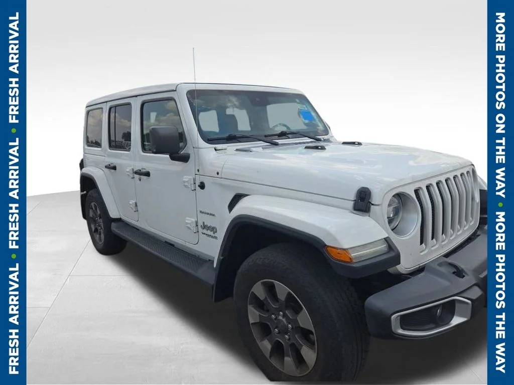 Used 2019 White Jeep Unlimited Sahara image 1