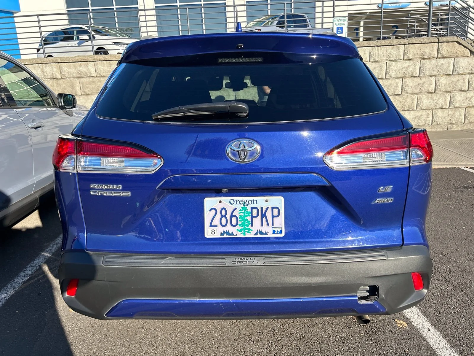Used 2022 Blue Crush Metallic Toyota LE image 5