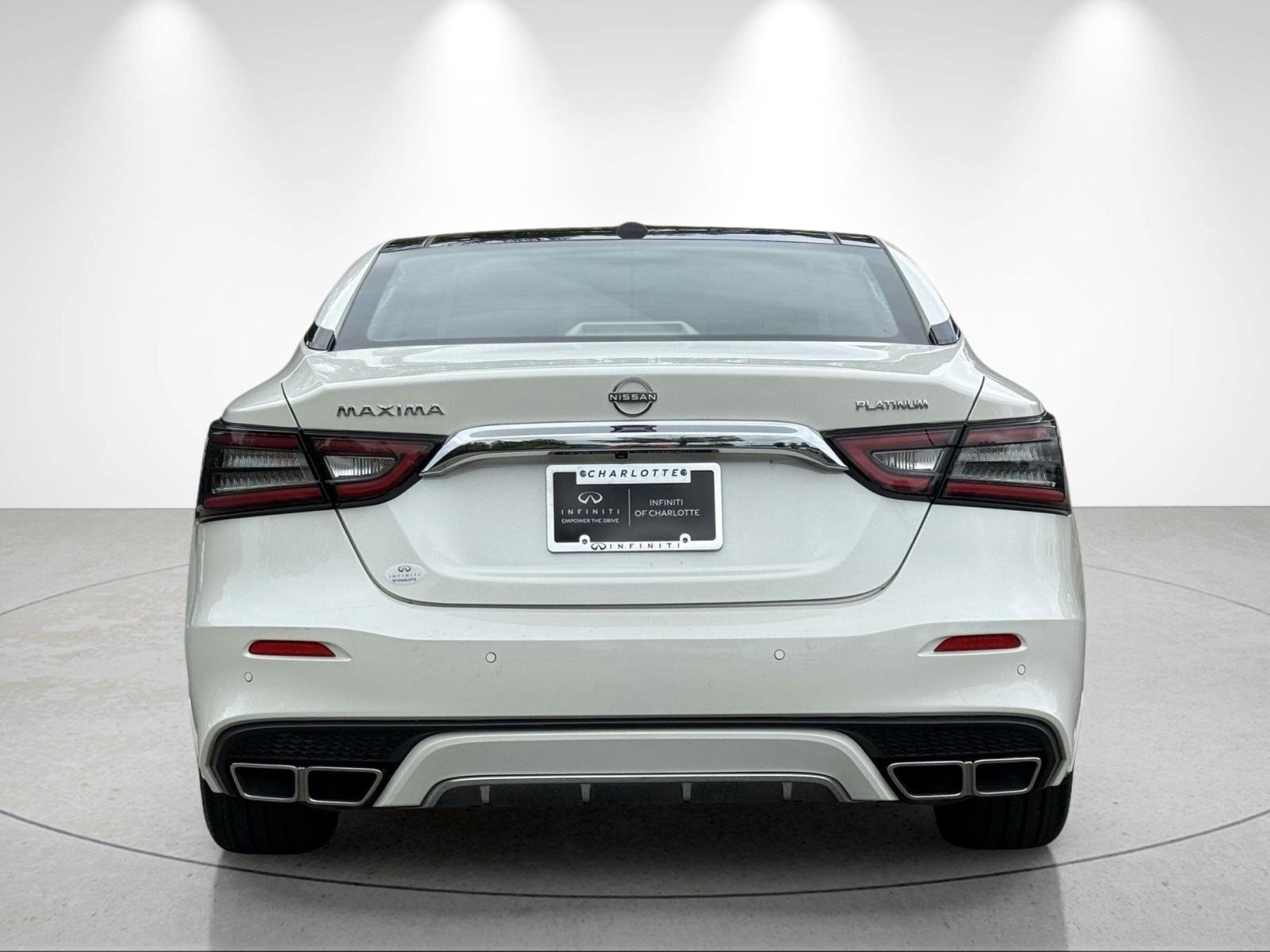 Used 2023 Pearl White Tricoat Nissan Platinum image 4